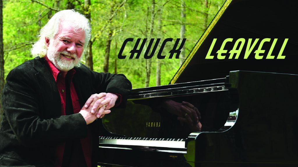 Chuck Leavell at a piano